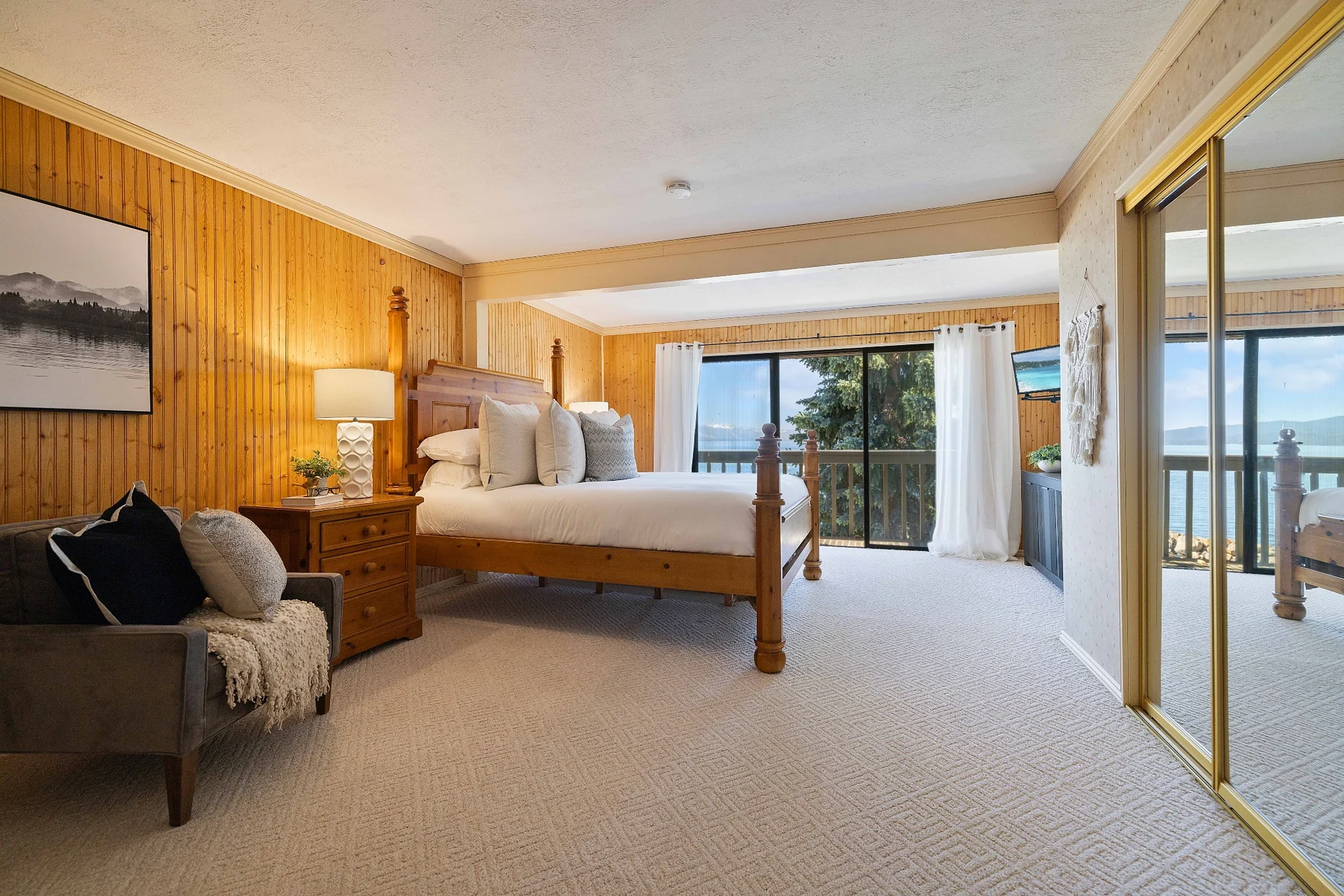 Primary suite with lake-view balcony