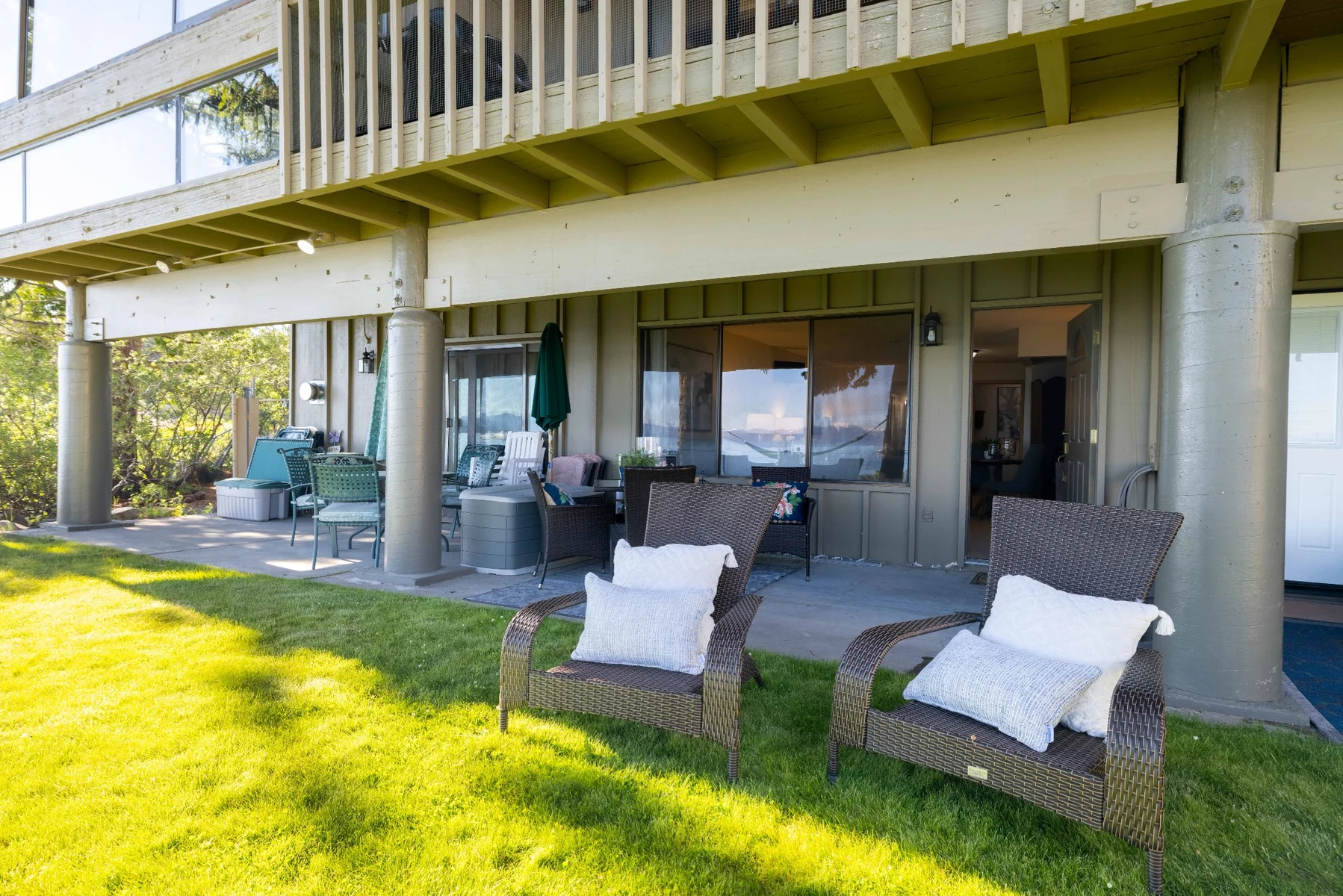 Walkout patio and lawn with outdoor seating