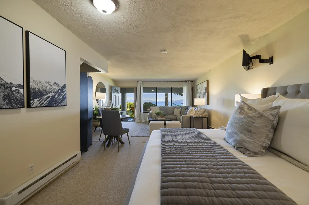 Lake view framed by sliding glass doors from the second living area