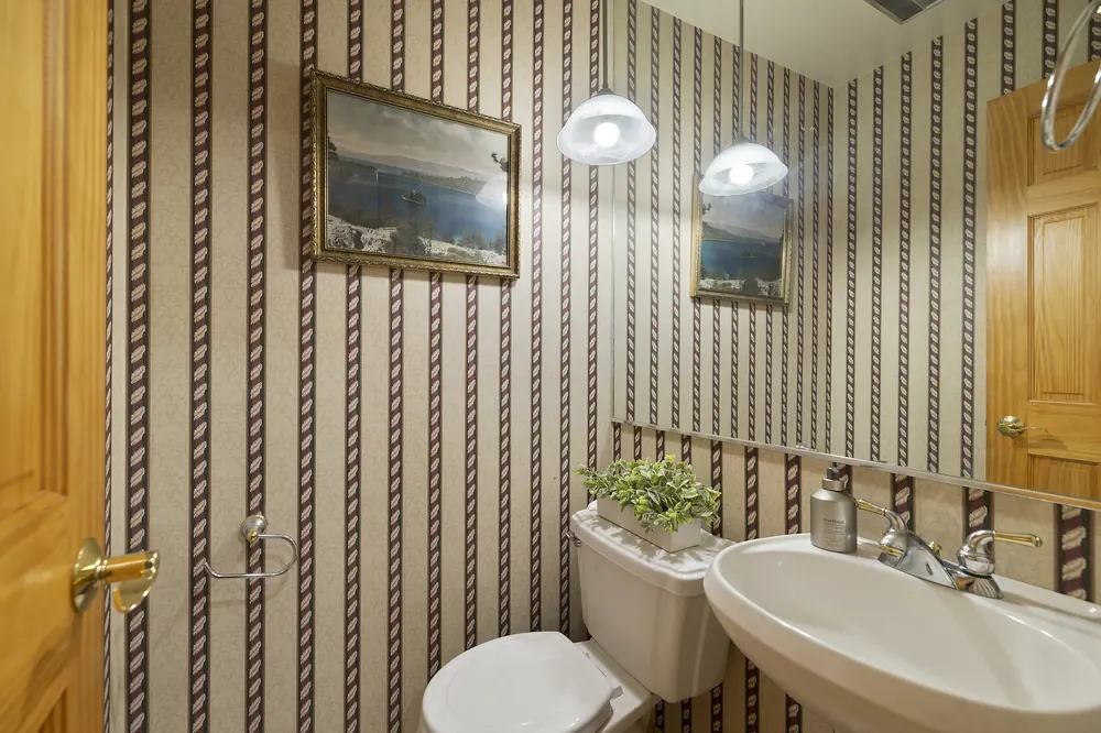 Powder room with framed vintage Lake Tahoe prints